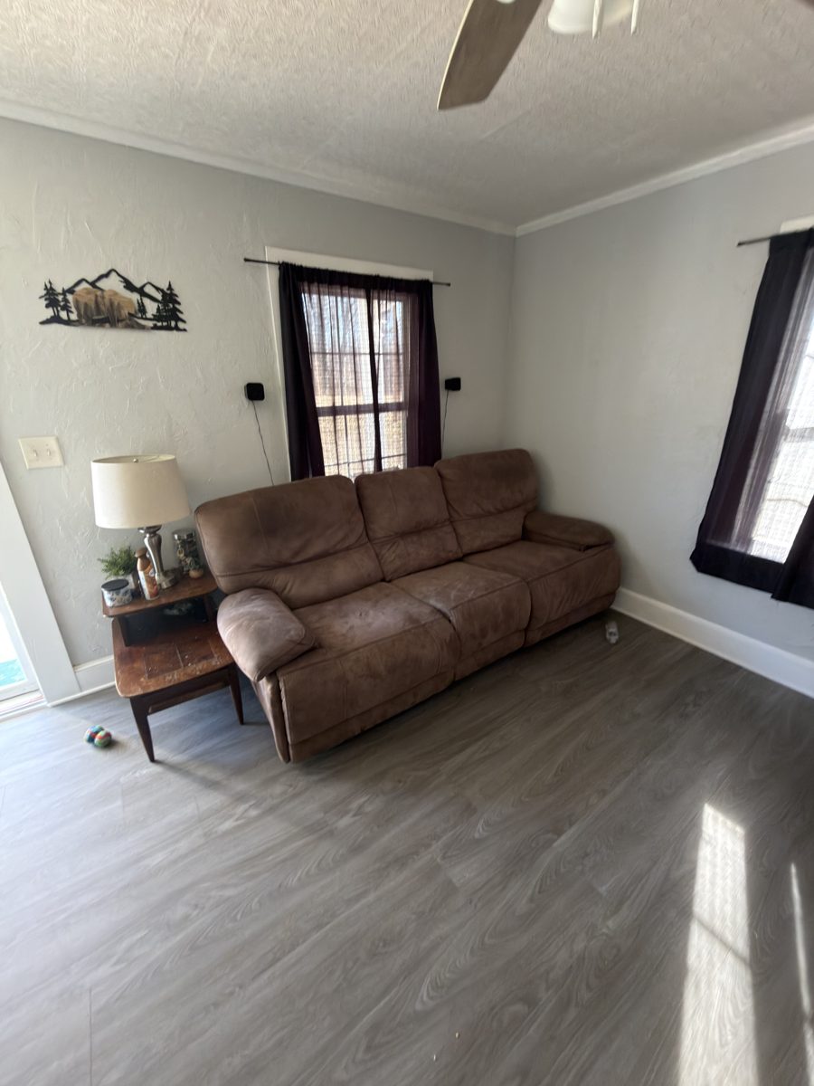 Finished gray LVP flooring in a living room